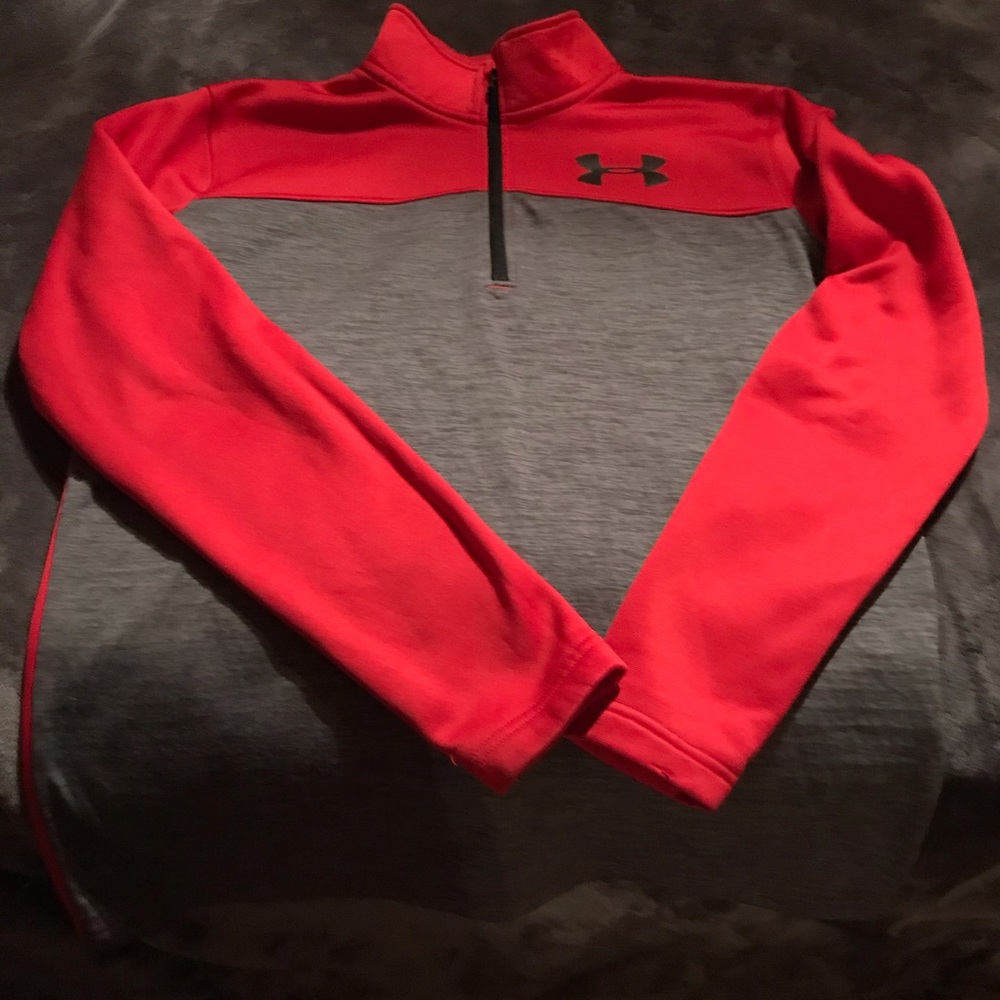 Half zip Under Armour sweatshirt for a boy.